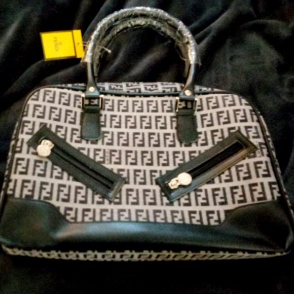 Fendi - Paul Frank - Puma - Tommy H. - Aldo - Frankie & Johnie - One of a kinds - Picture 1 of 16